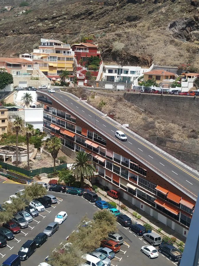 Engineering Marvel of Tenerife’s Road Over Building - Nickey's Circle